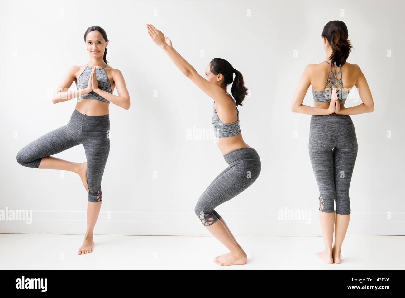 Series of Mixed Race woman doing yoga poses Stock Photo