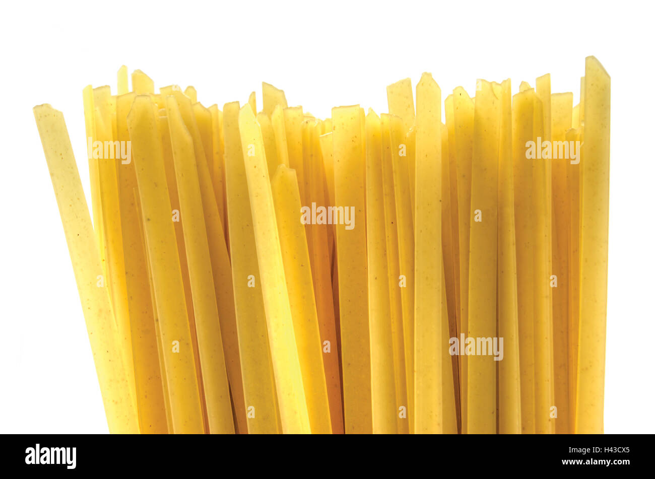 Flat spaghetti pasta background, isolated, large detailed vertical macro  closeup Stock Photo - Alamy