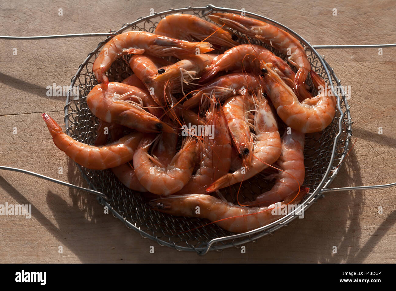 Cooked shrimp in colander, Atlantic Coast, France Stock Photo