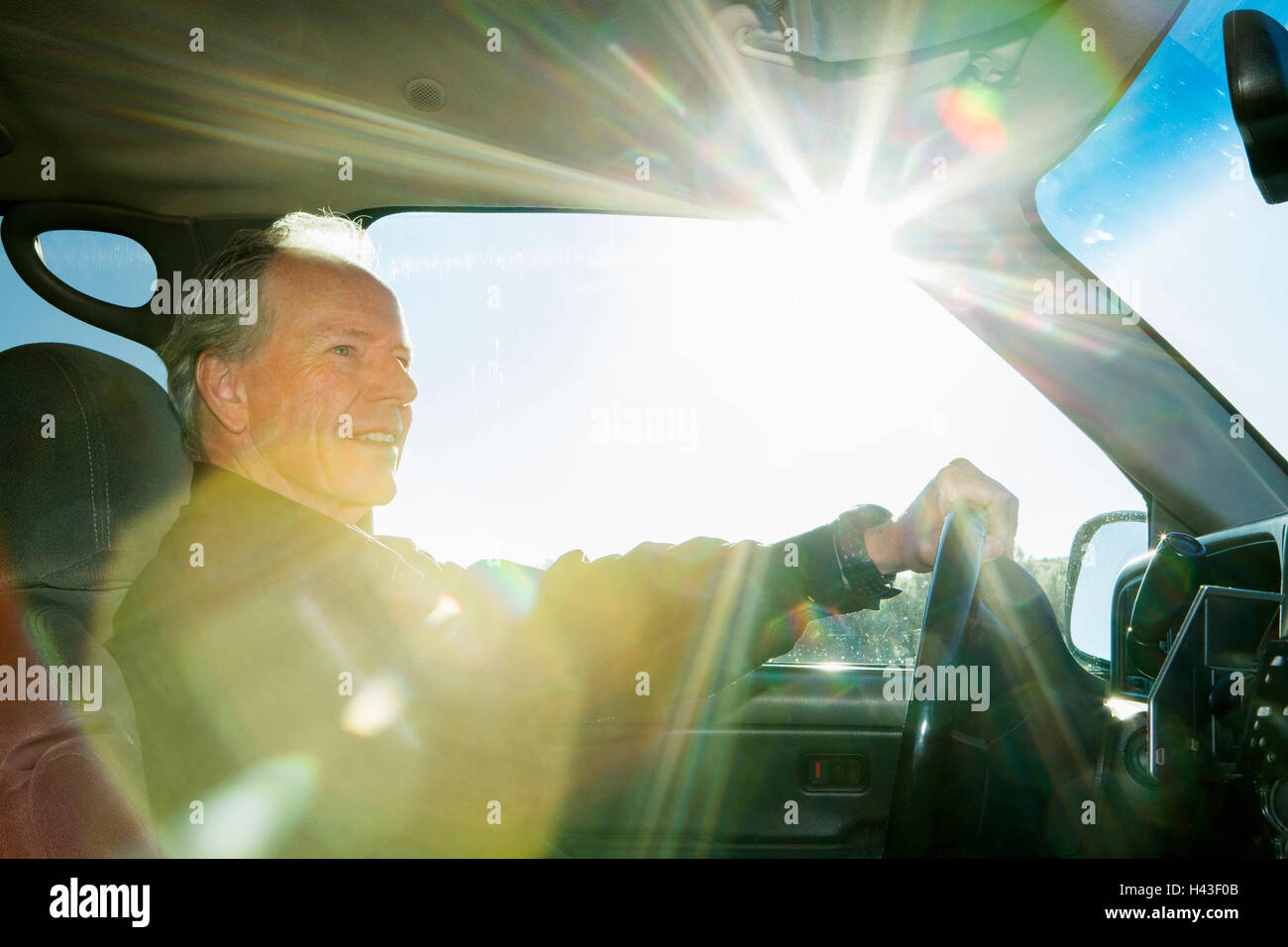 Elderly man driving car hi-res stock photography and images - Alamy