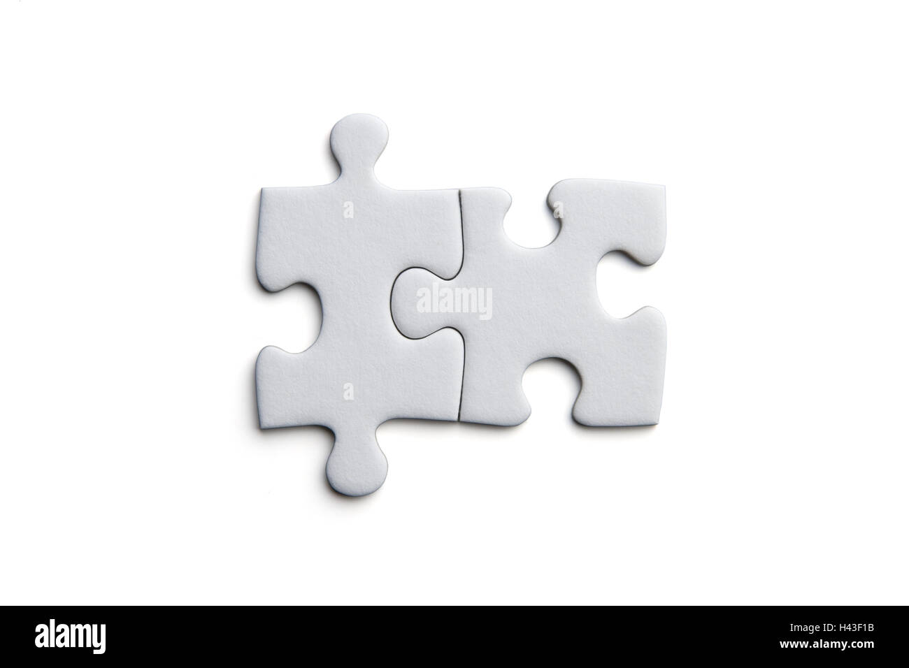 Jigsaw puzzle parts, white, cutout Stock Photo Alamy