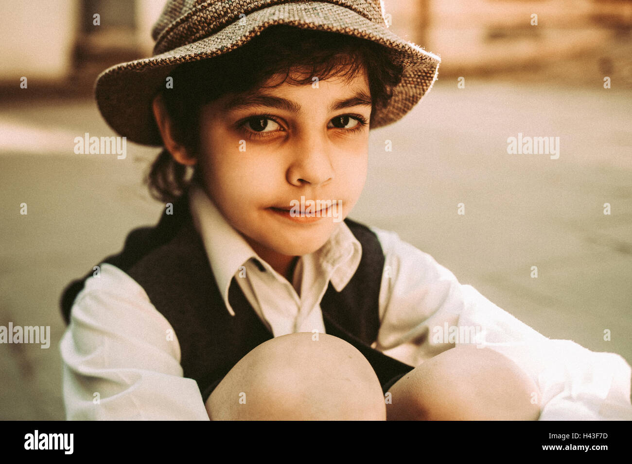 Old-fashioned Caucasian boy with black eye Stock Photo