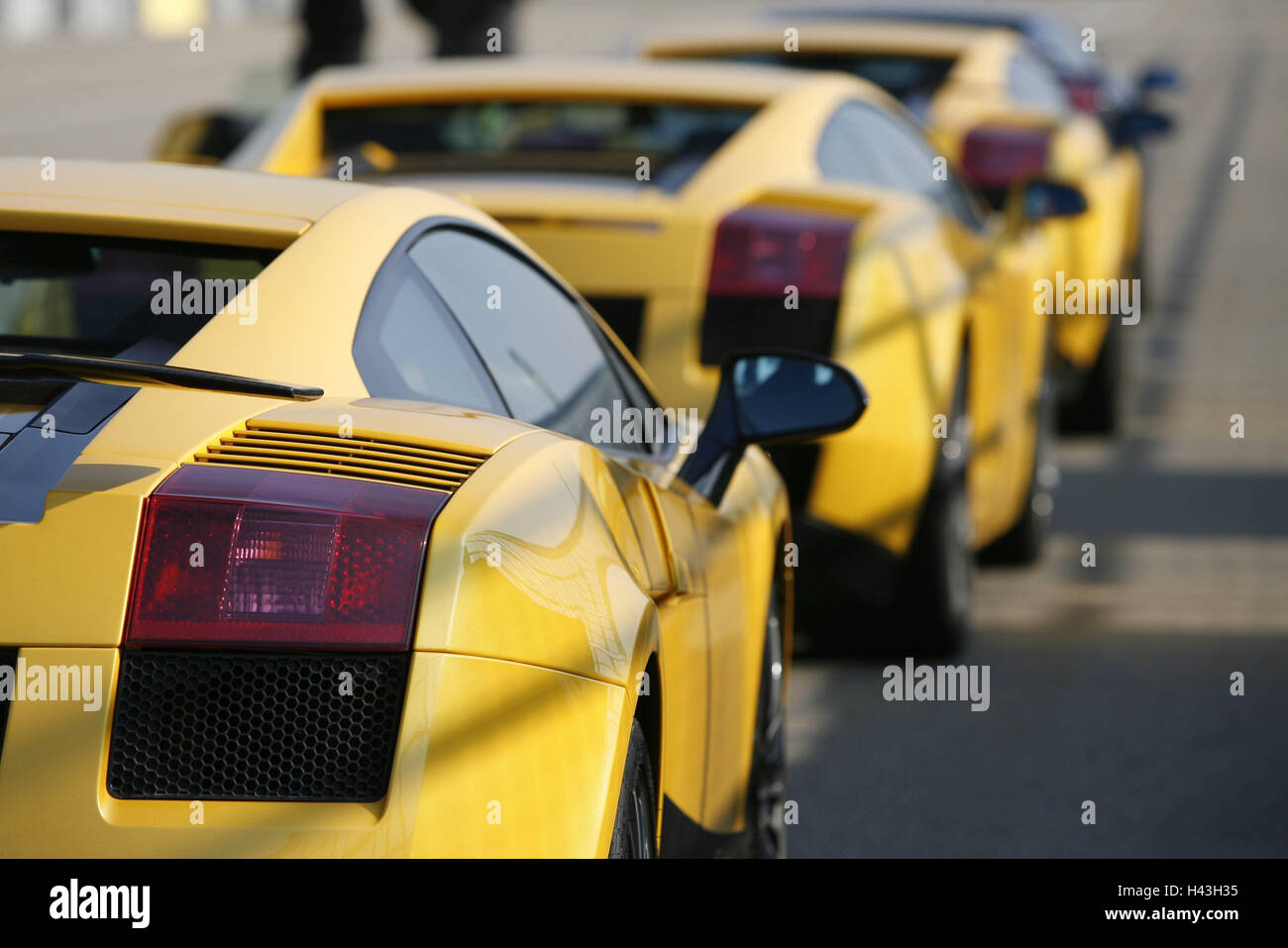 Lamborghinis, yellow, rear view, Saxon's ring, 3rd formation, cars, outside, three, Lamborghini, luxury, luxury cars, sports cars, nobly, exclusively, stand, one after the other, curled, outside, Stock Photo