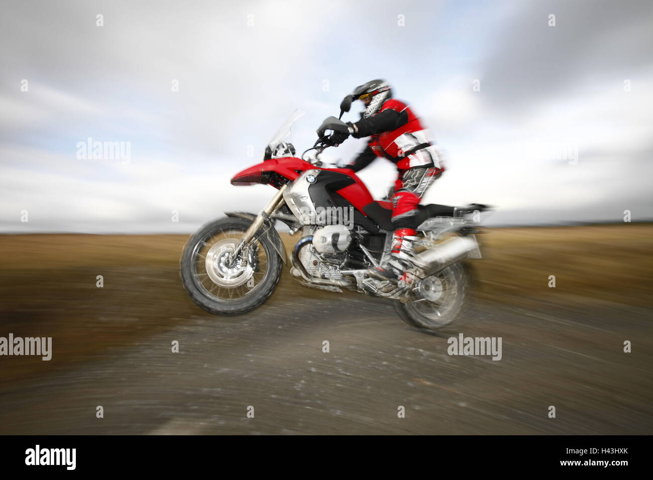 Motorcyclist, BMW R 1200 GS, dynamically, Stock Photo
