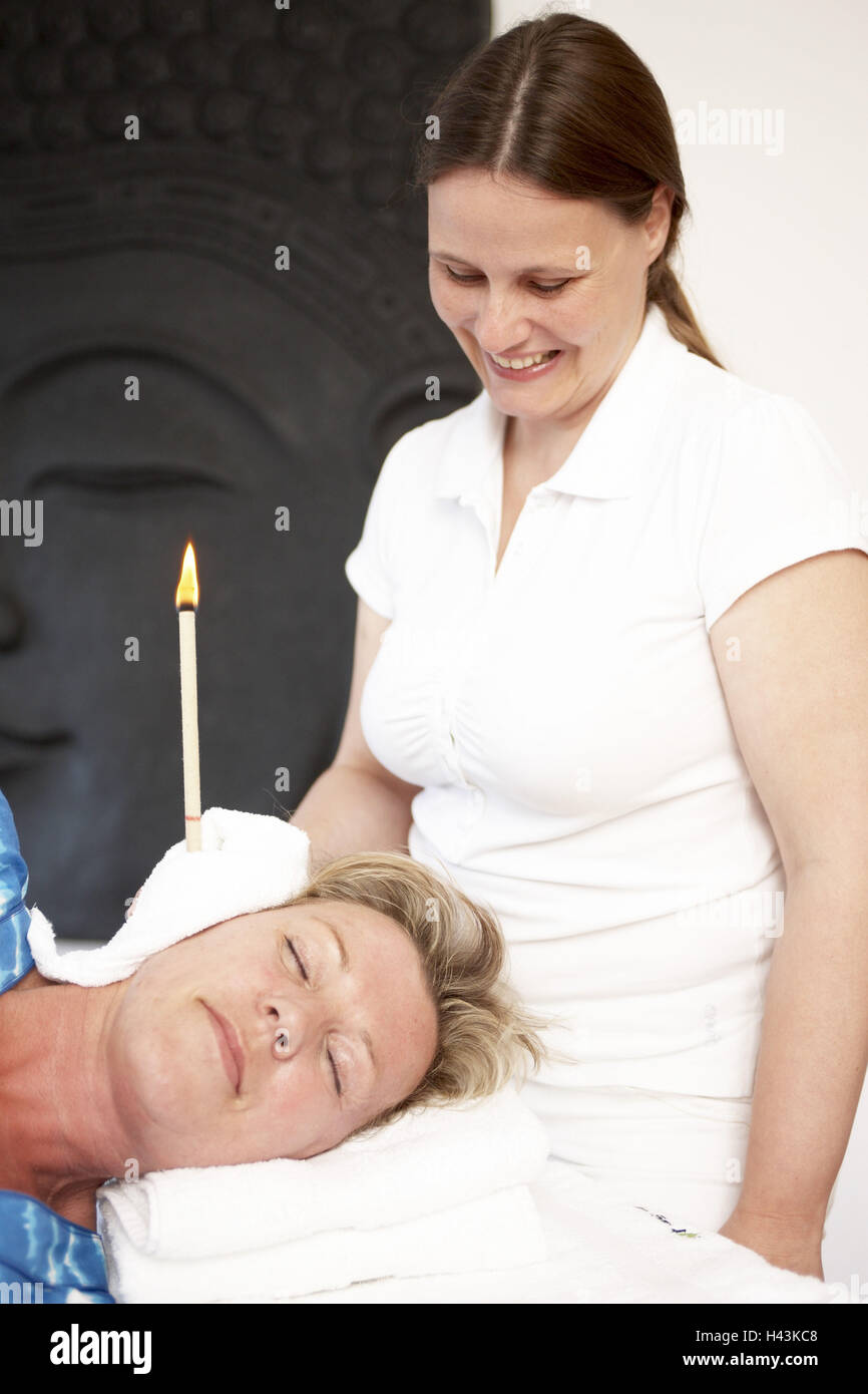 Medical spa, therapy, Aural Float, ear candle treatment, Stock Photo