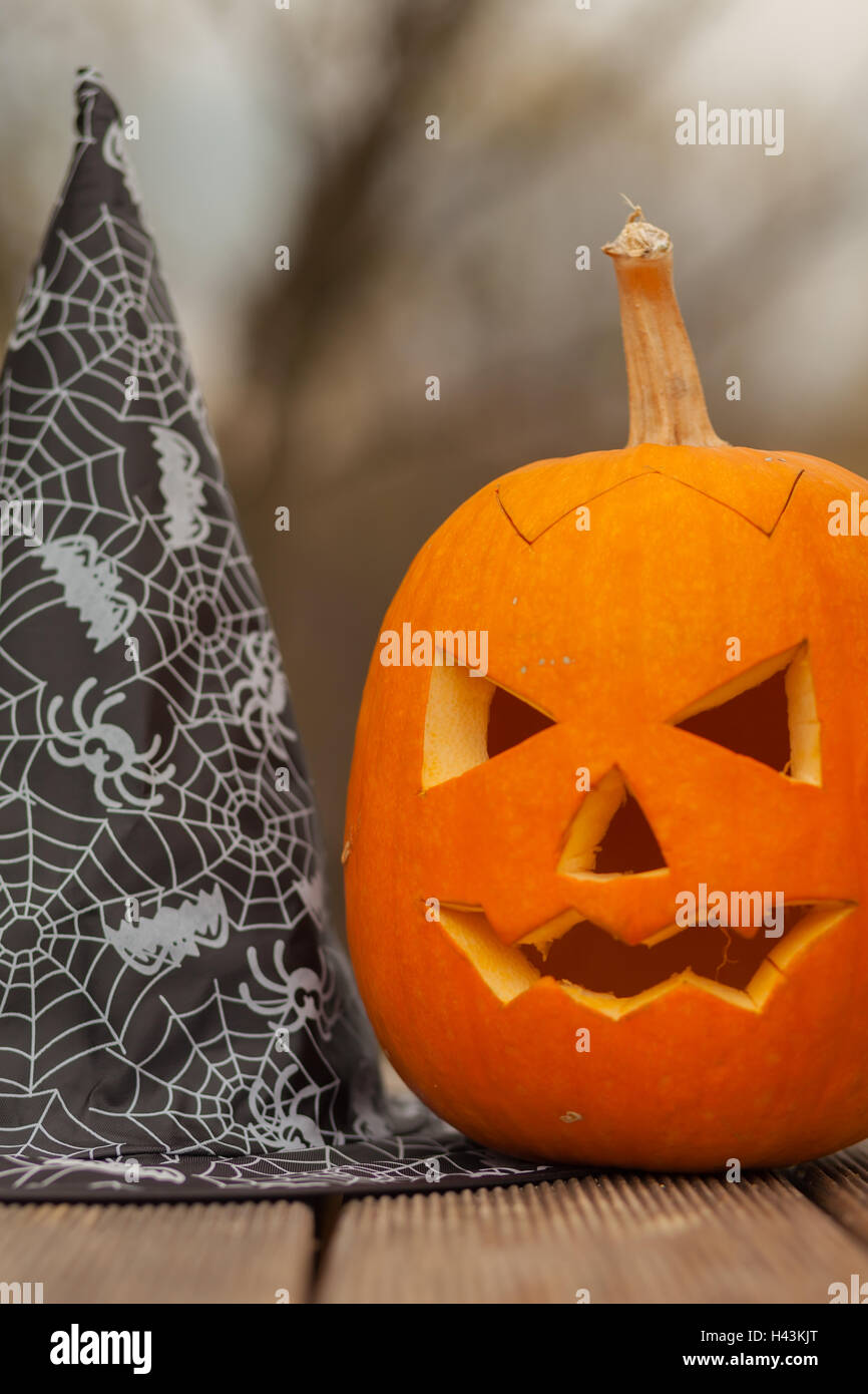 Halloween Jack-o-lantern and a witches hat Stock Photo