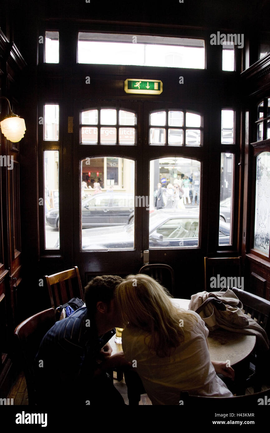 UK, England, London, Notting Hill, cafe, couple, in love, kissing, back view, Stock Photo