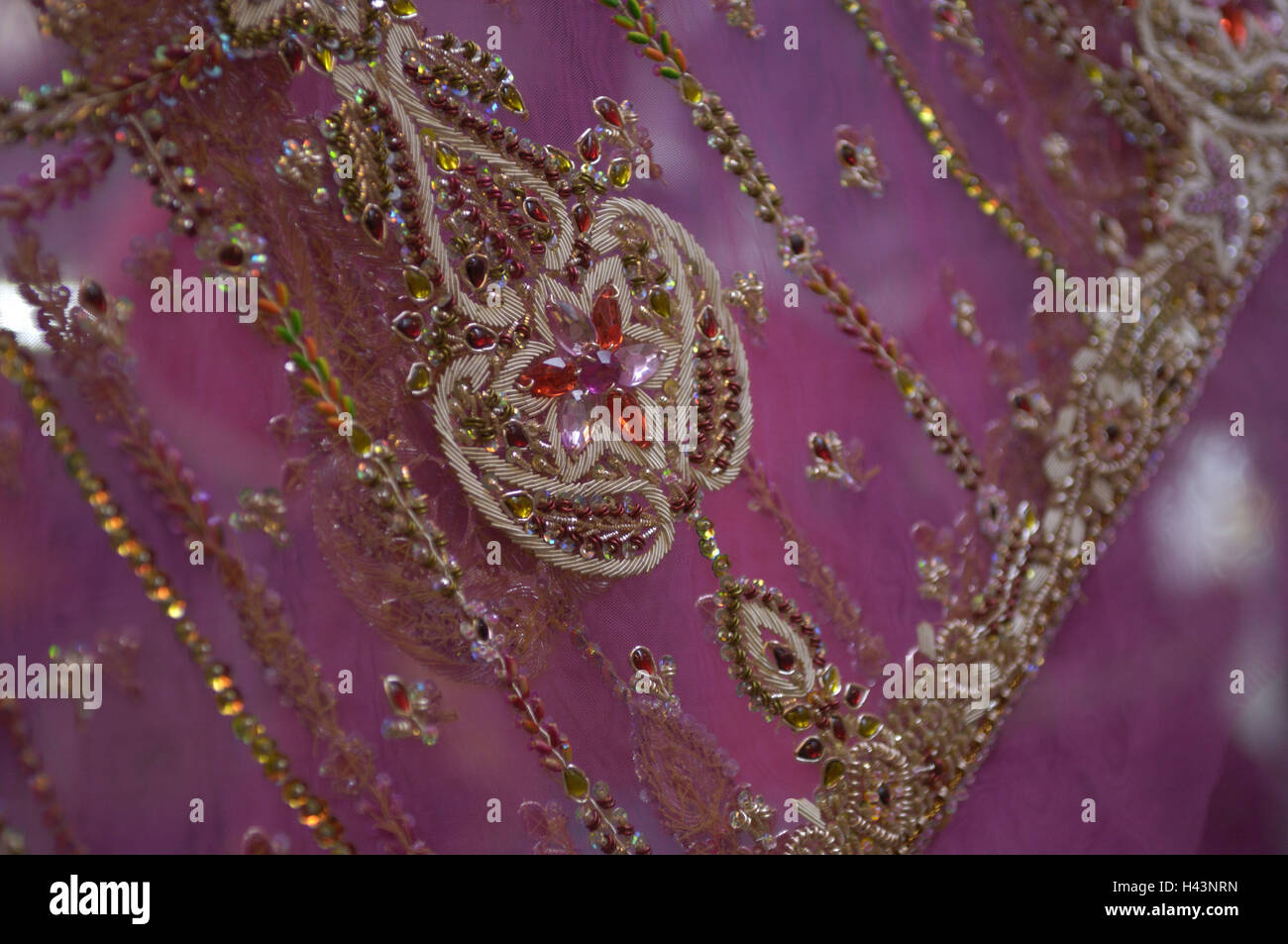 Indian Crafts Embroidery in gold thread on hand woven silk sari fabric from  Mysore Karnataka detail Stock Photo - Alamy