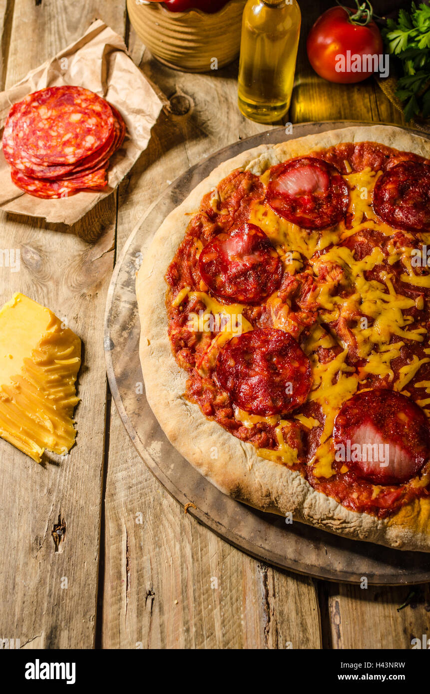 Rustic salami pizza with cheddar cheese and chorizo, delicious chorizo ...