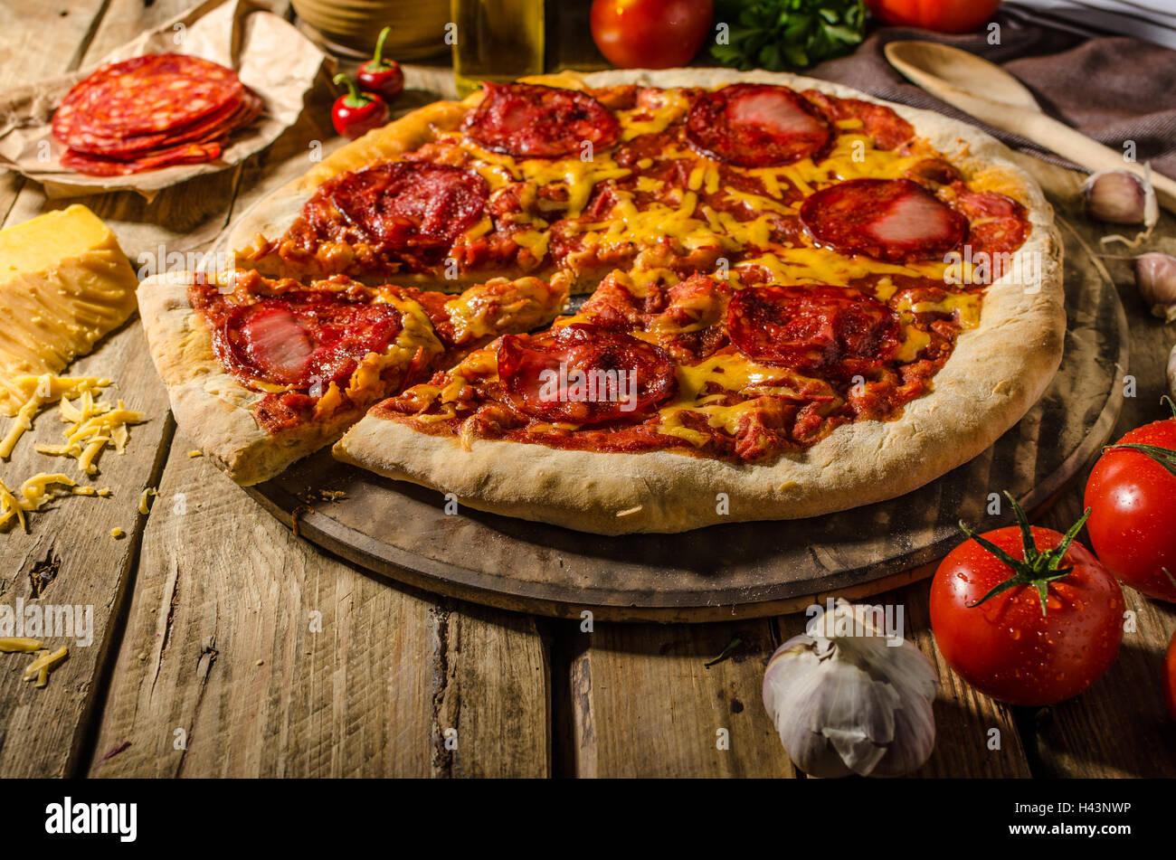 Rustic salami pizza with cheddar cheese and chorizo, delicious chorizo ...