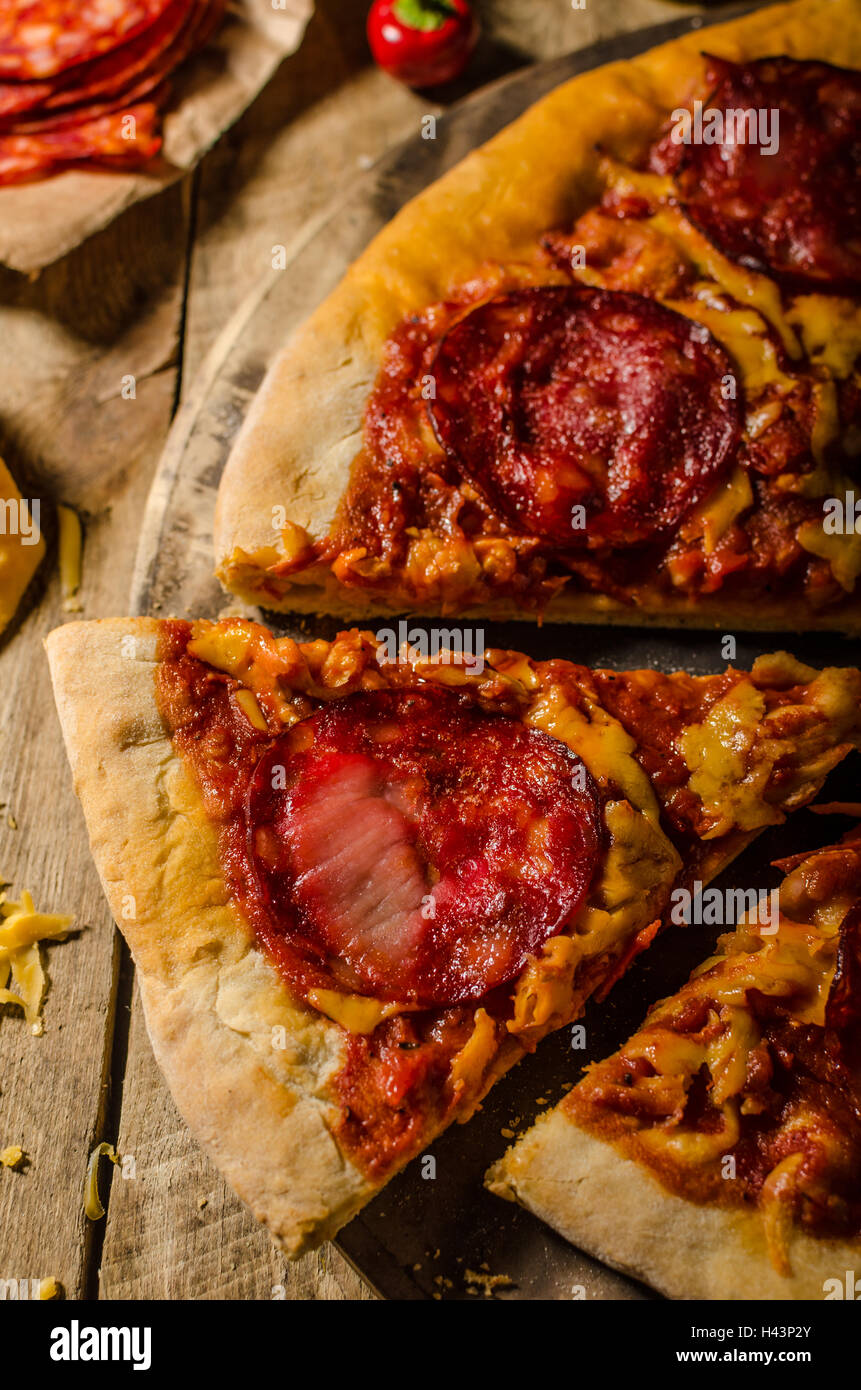 Rustic salami pizza with cheddar cheese and chorizo, delicious chorizo ...