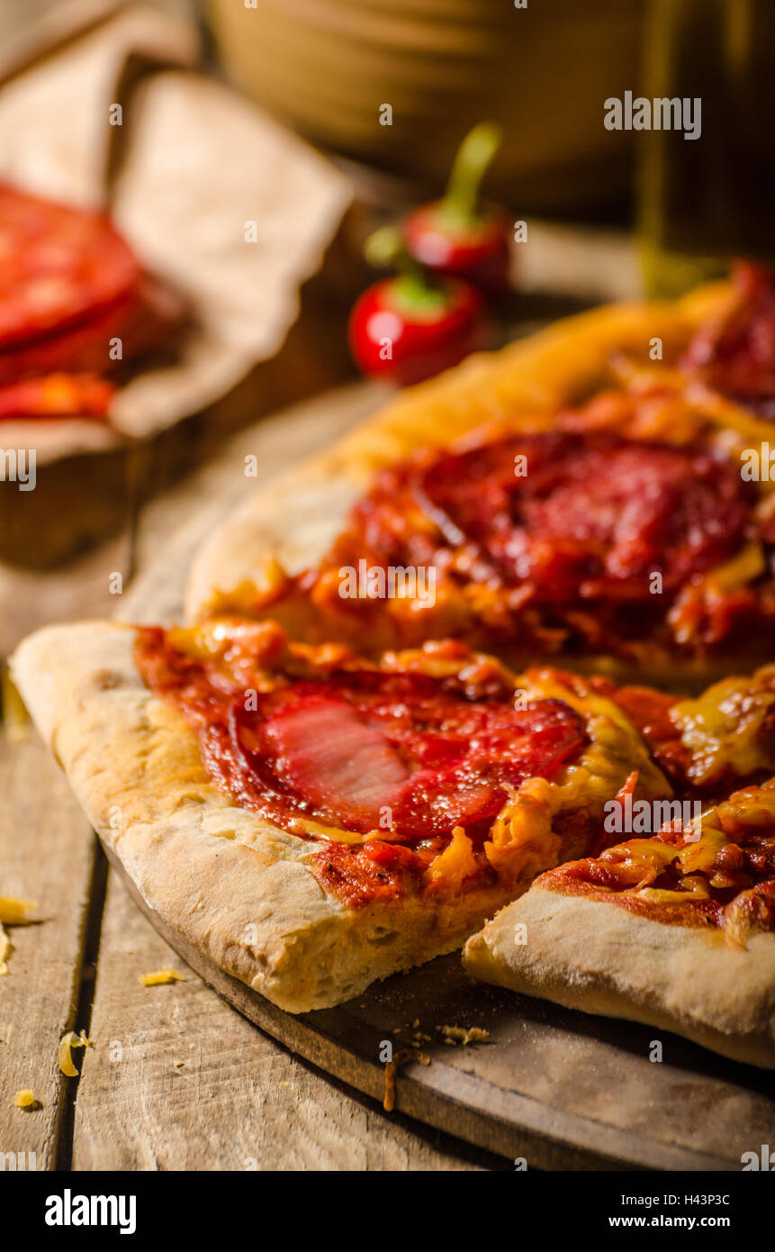 Rustic salami pizza with cheddar cheese and chorizo, delicious chorizo ...