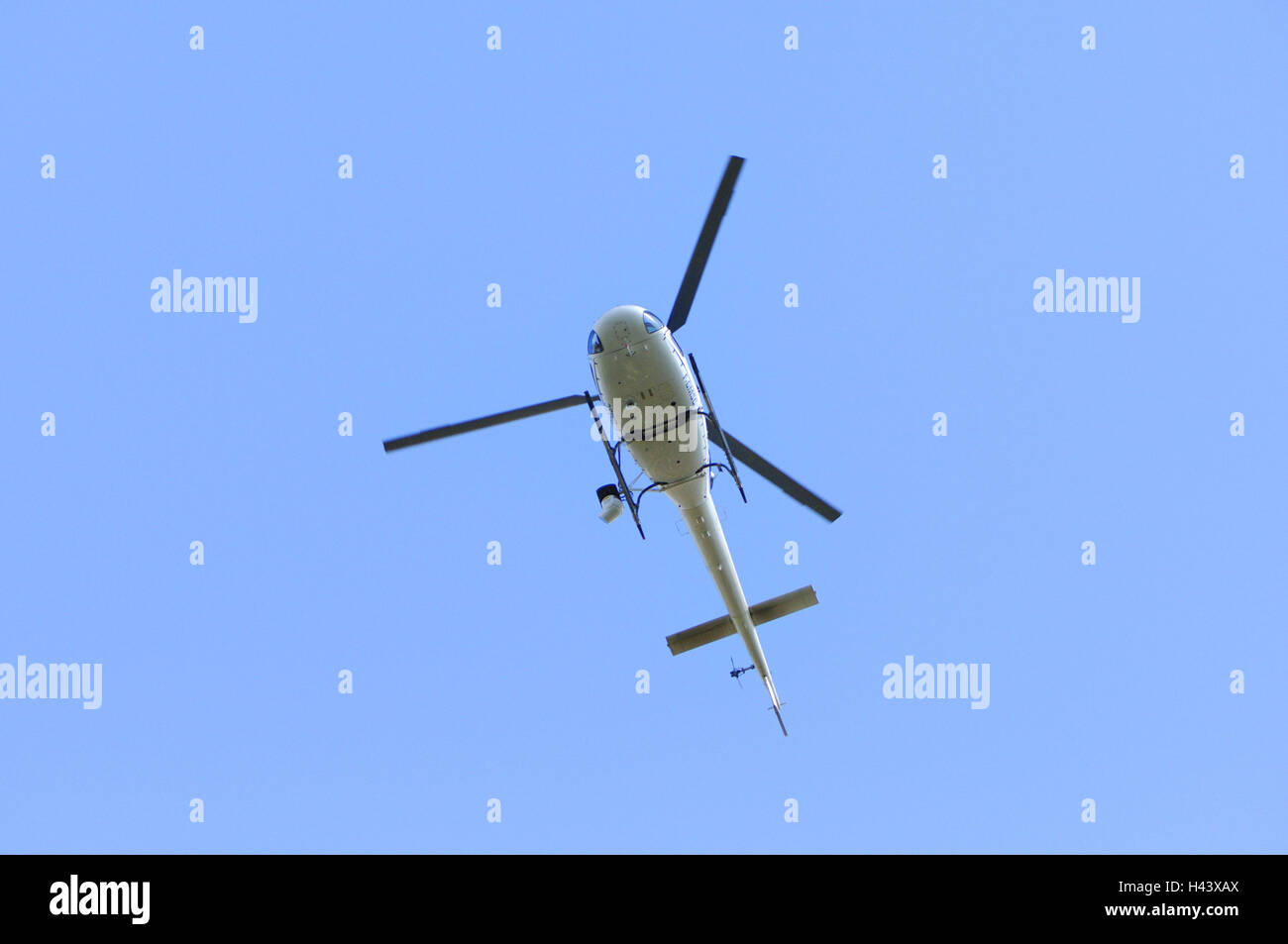 Police helicopter, from below, Stock Photo