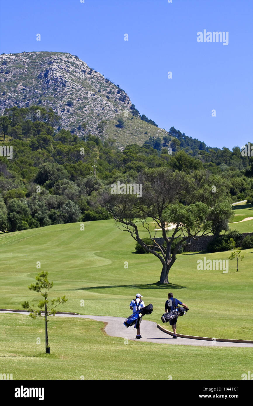 Spain, the Balearic Islands, island Majorca, golf course, Green, men, golf bags, carry, back view, no model for release, Stock Photo
