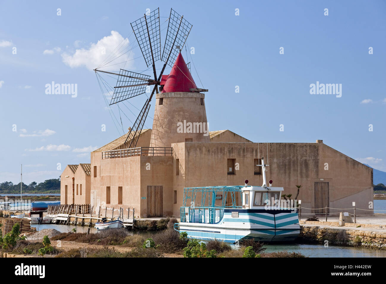 Italy, island Sicily, Trapani, windmill, saltworks, excursion boat