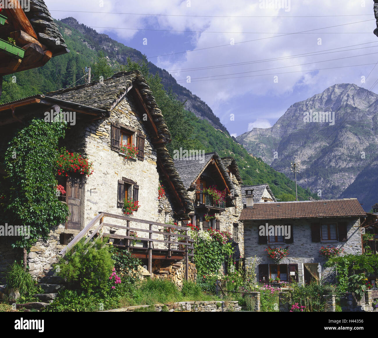 Switzerland, Ticino, mountain village Sonogno, houses, old, Europe, alp room, place, village, residential houses, stone houses, stone structure way, typically, flowers, summers, outside, deserted, building, architecture, heaven, clouds, Stock Photo