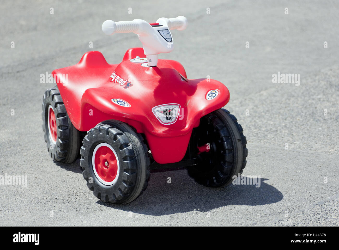 Bobbyquad, no property release, Bobby's coach, form, Quad, car, red, toys, toys car, street, toys, cross-country vehicle, outside, deserted, Stock Photo