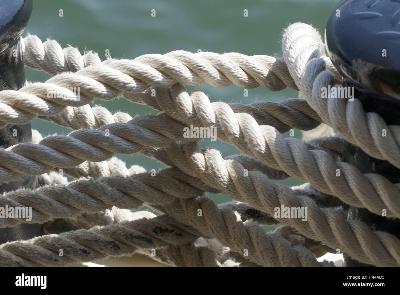 Rope, pile, water Stock Photo Alamy