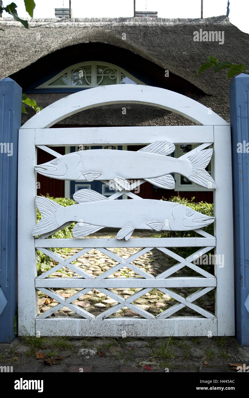 Wooden gate with fish figures hires stock photography and images Alamy