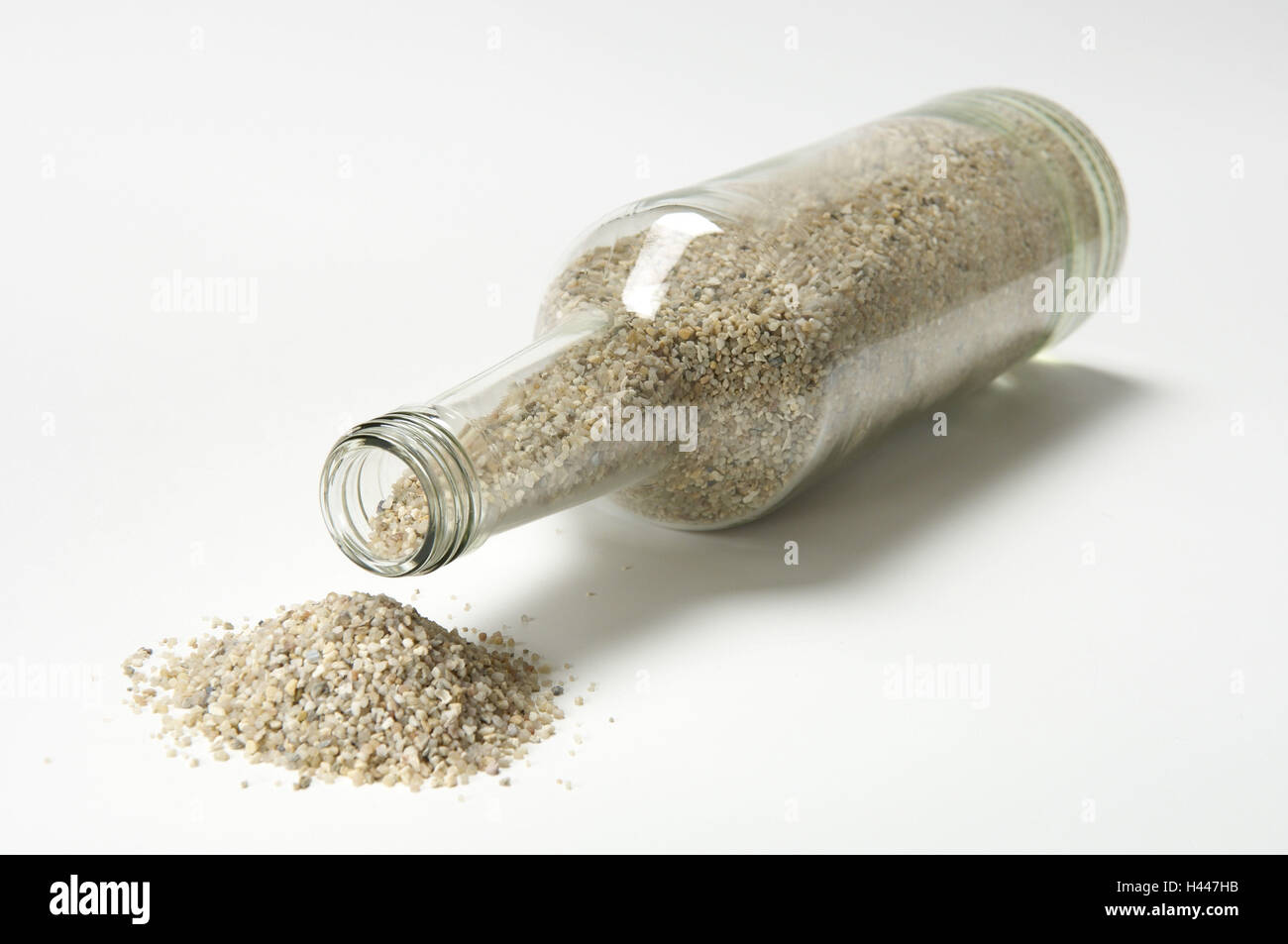 Glass bottle, sand Stock Photo Alamy