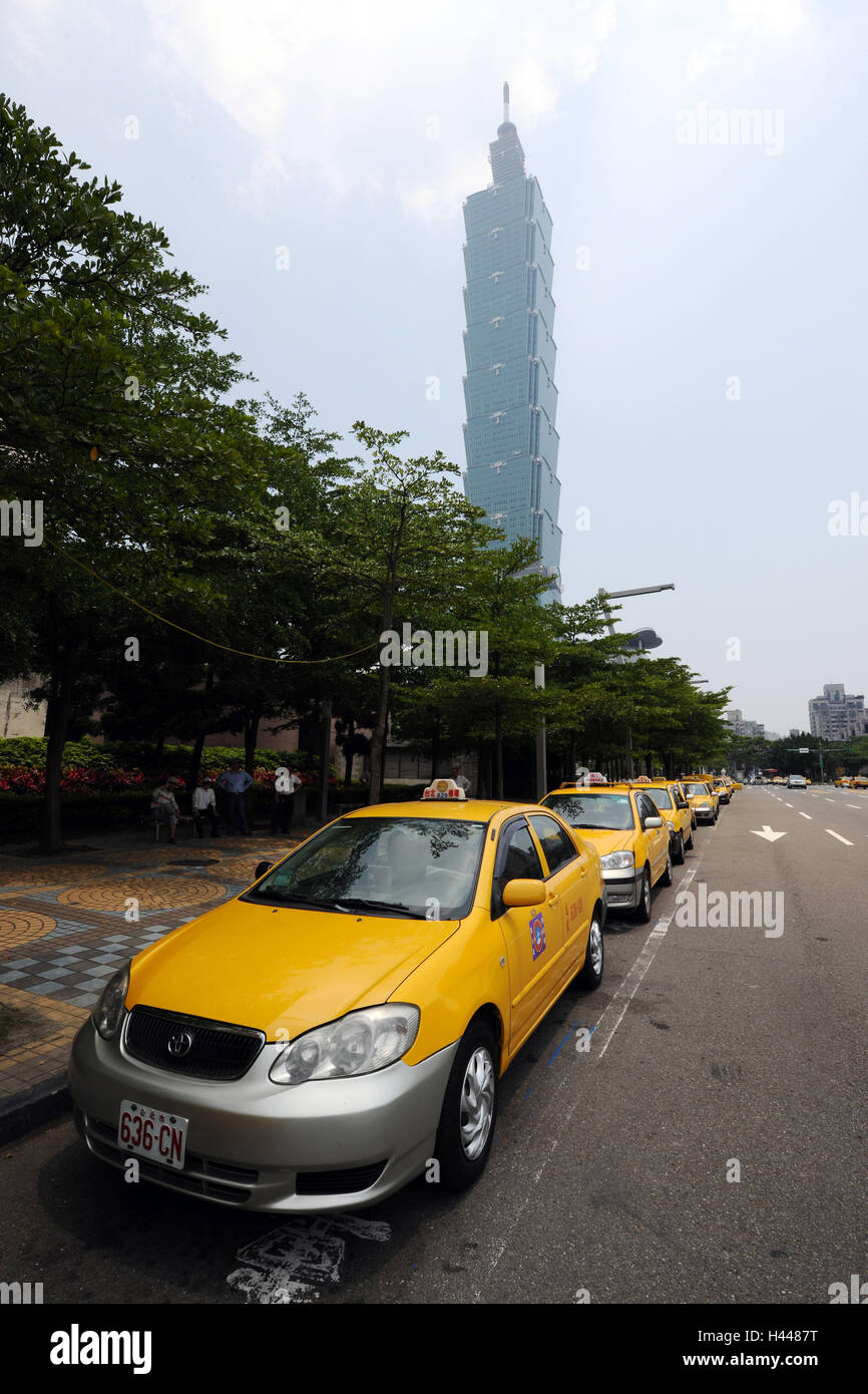 Taxis, roadside, trees, Taipei 101 Tower, skyscrapers, Taipeh, Taiwan, Stock Photo