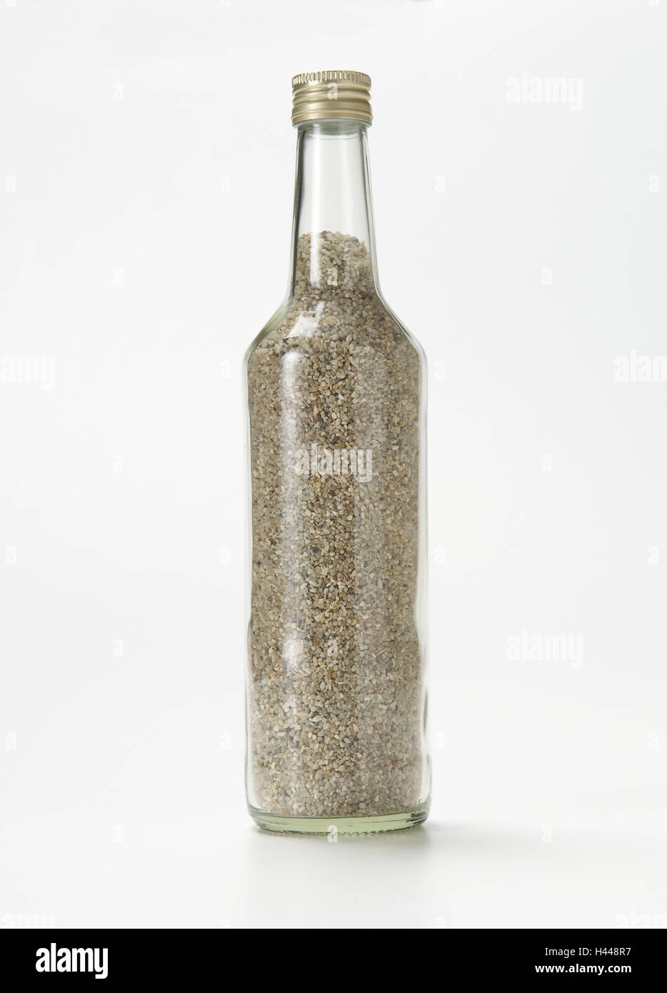 Glass bottle, sand Stock Photo Alamy
