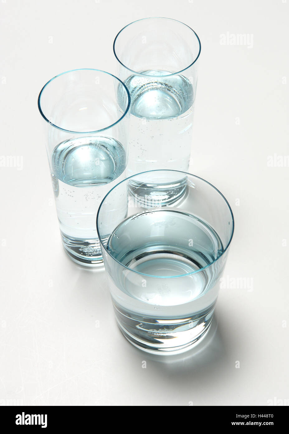 Three different glass glasses water hires stock photography and images