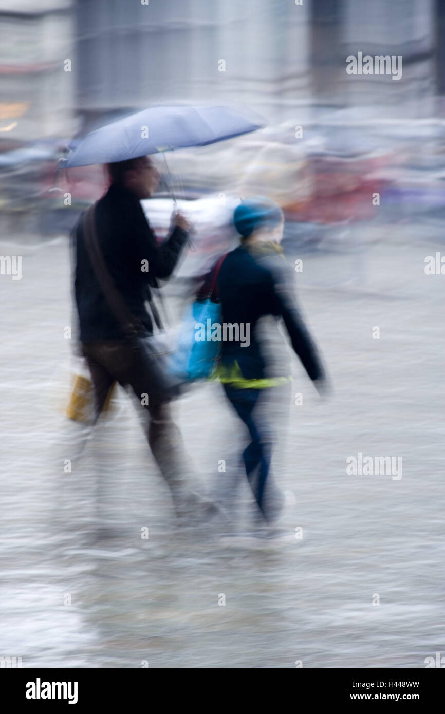 Pedestrians, couple, umbrella, blur, no model release, person, two, people, shop, bags, pouches, outside, together, woman, man, passer-by, display screen, rainy, rain weather, weather, Stock Photo