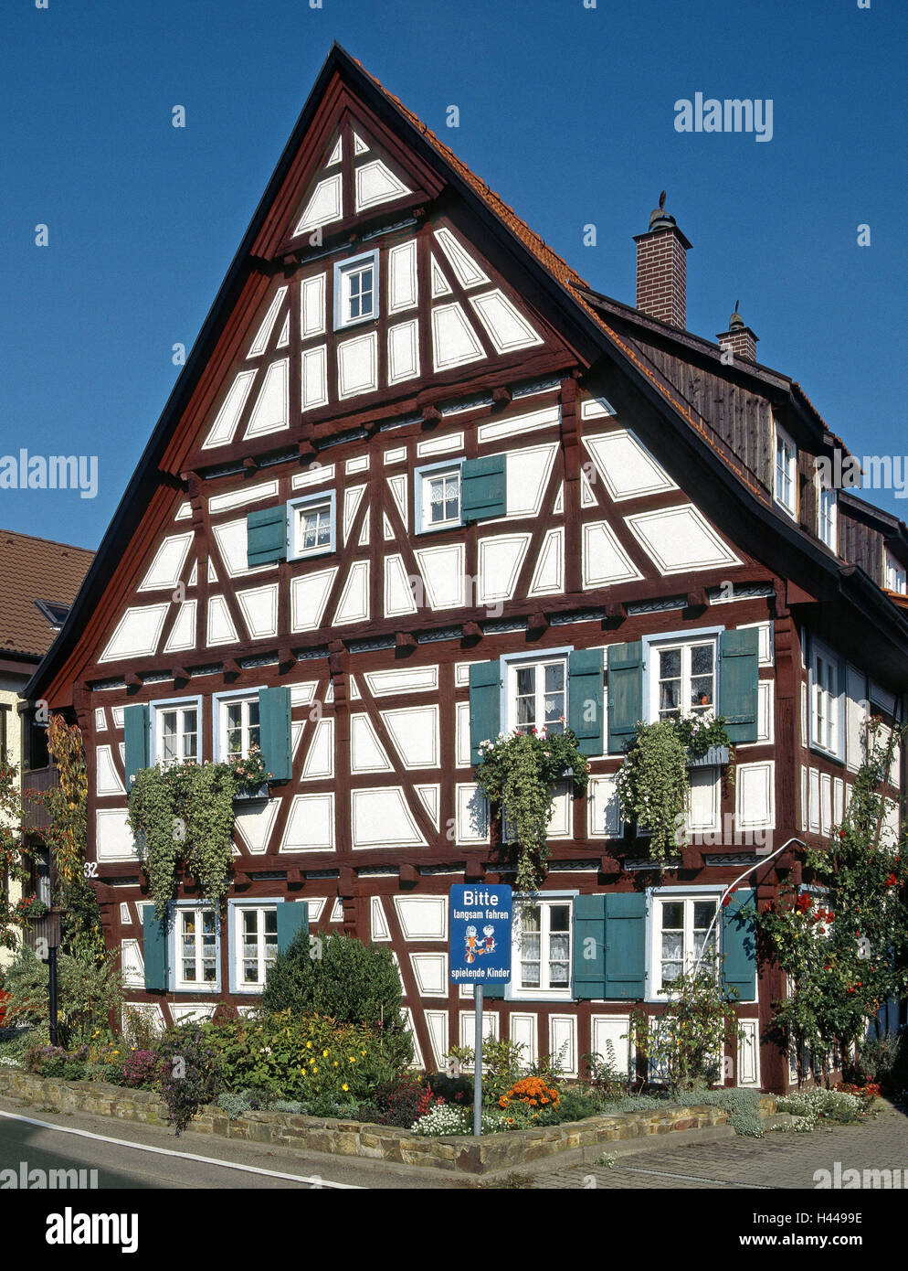 Germany, Baden-Wurttemberg, Aichwald (village), district Aichelberg (disrict), half-timbered house, outside, Aichelberg (disrict), place, building, house, outside, architectural style, half-timbered, half-timbered gable, gable, Poststrasse, garden, flower Stock Photo