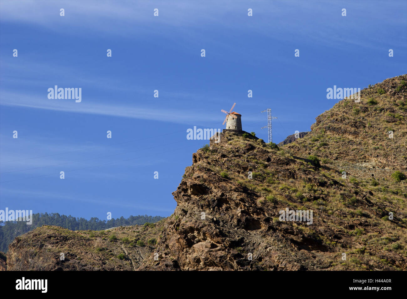 Spain, Canary islands, grain Canaria, central massif, Barranco de la Aldea, rocks, windmill, power poles, Stock Photo