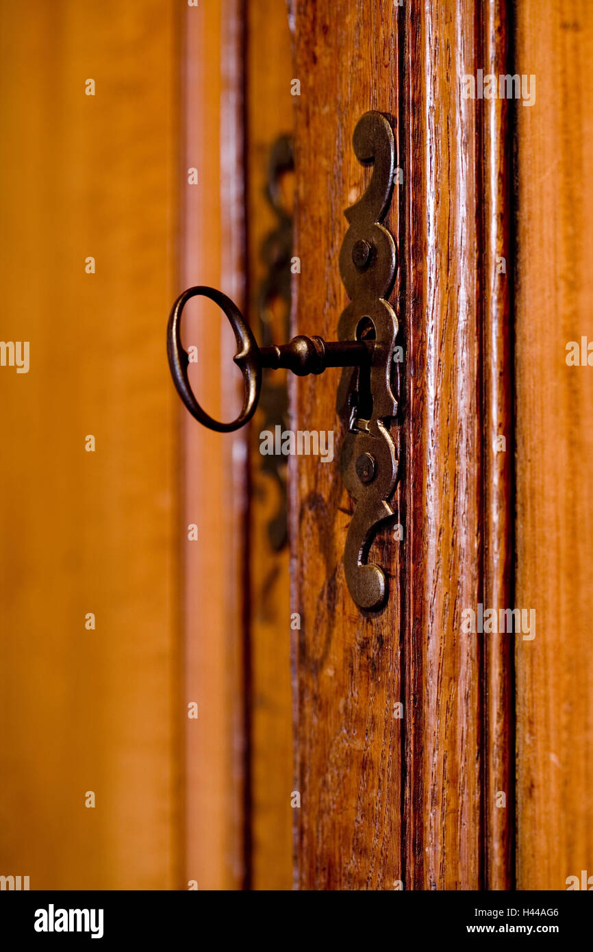 Cupboard door, key, closeup Stock Photo Alamy