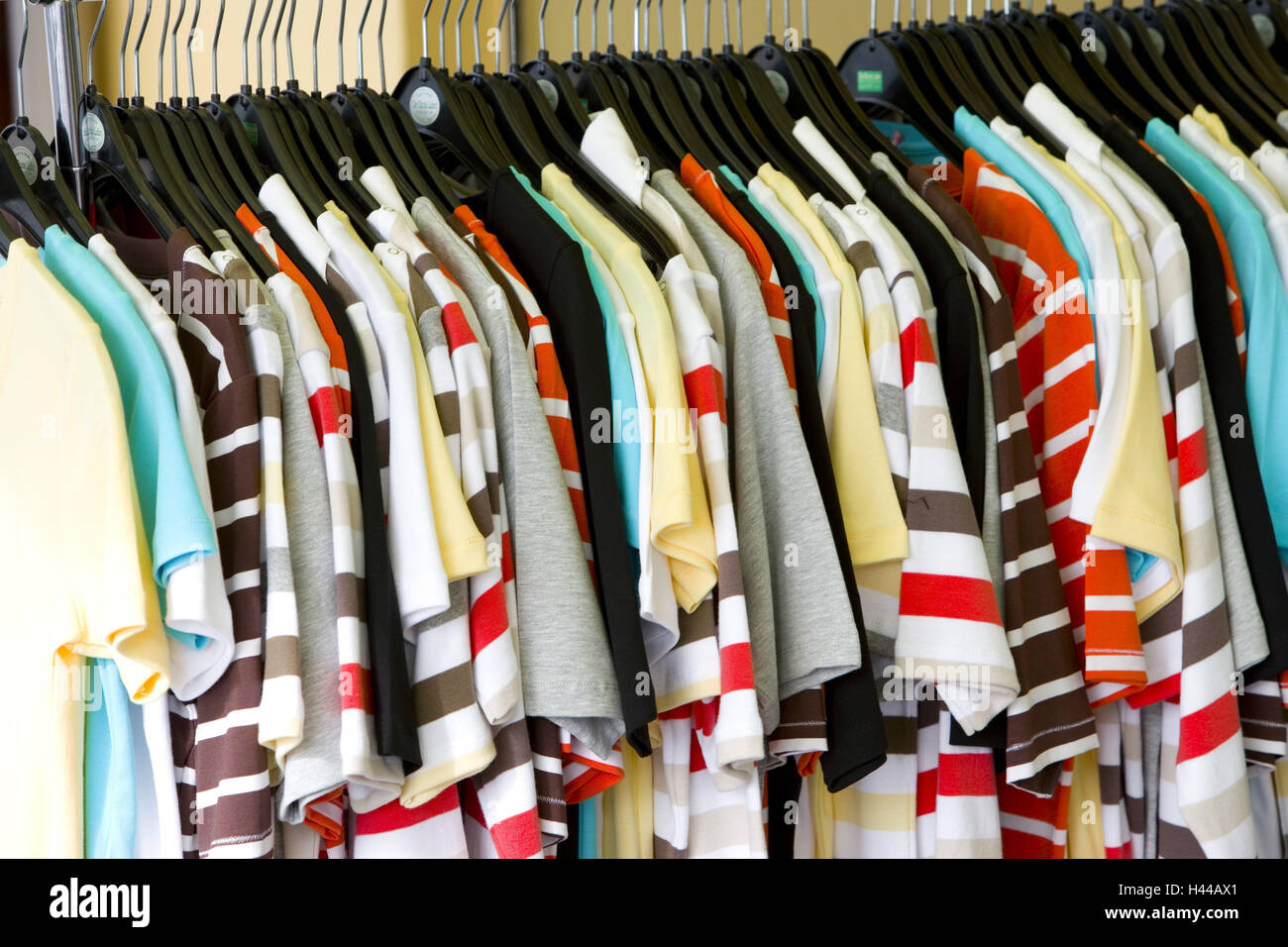 Clothes stand, T-shirts Stock Photo - Alamy