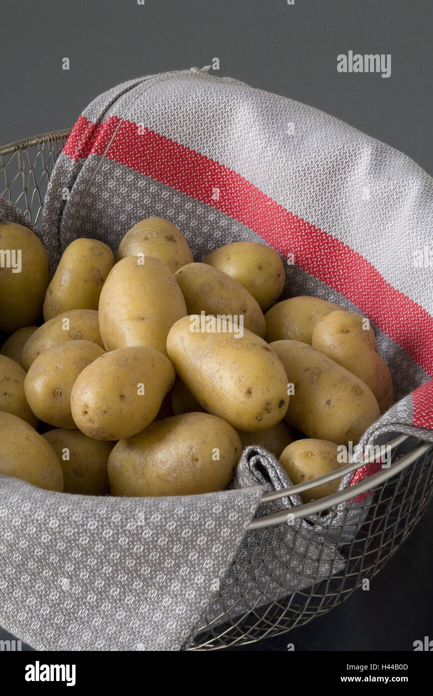 Wire basket, kitchen cloth, potatoes, detail Stock Photo Alamy