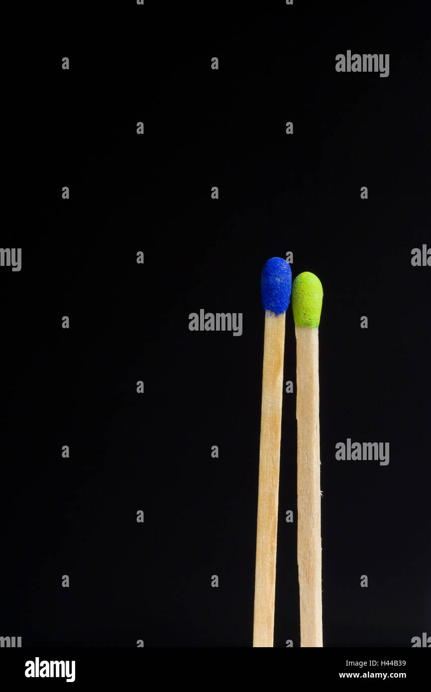 Matches, green, blue, cut out, background black Stock Photo Alamy