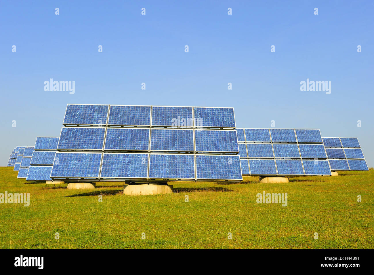 Meadow, solar collectors, solar cells Stock Photo Alamy