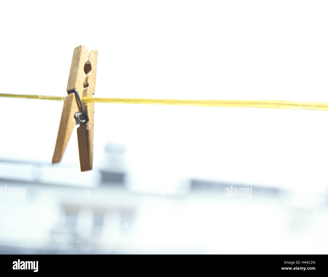 Clothes pin, clothes line, yellow Stock Photo Alamy