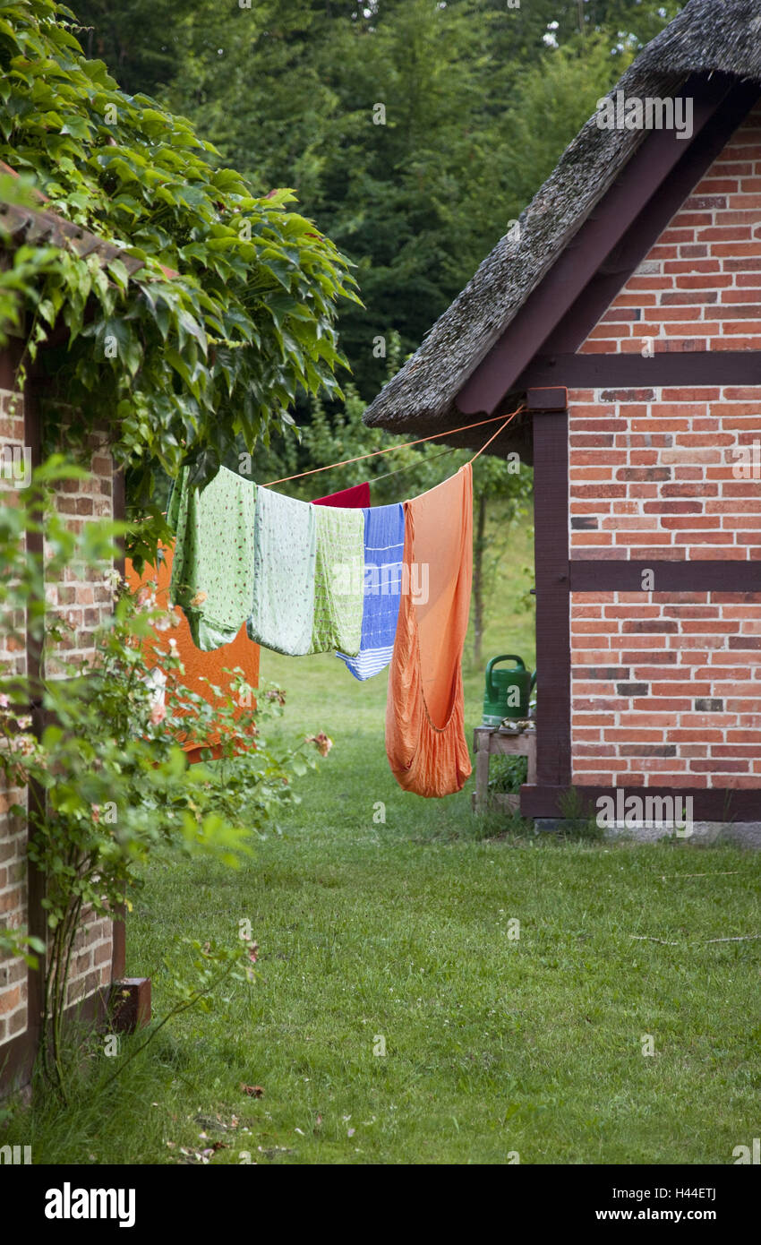 House, garden, clothesline Stock Photo Alamy
