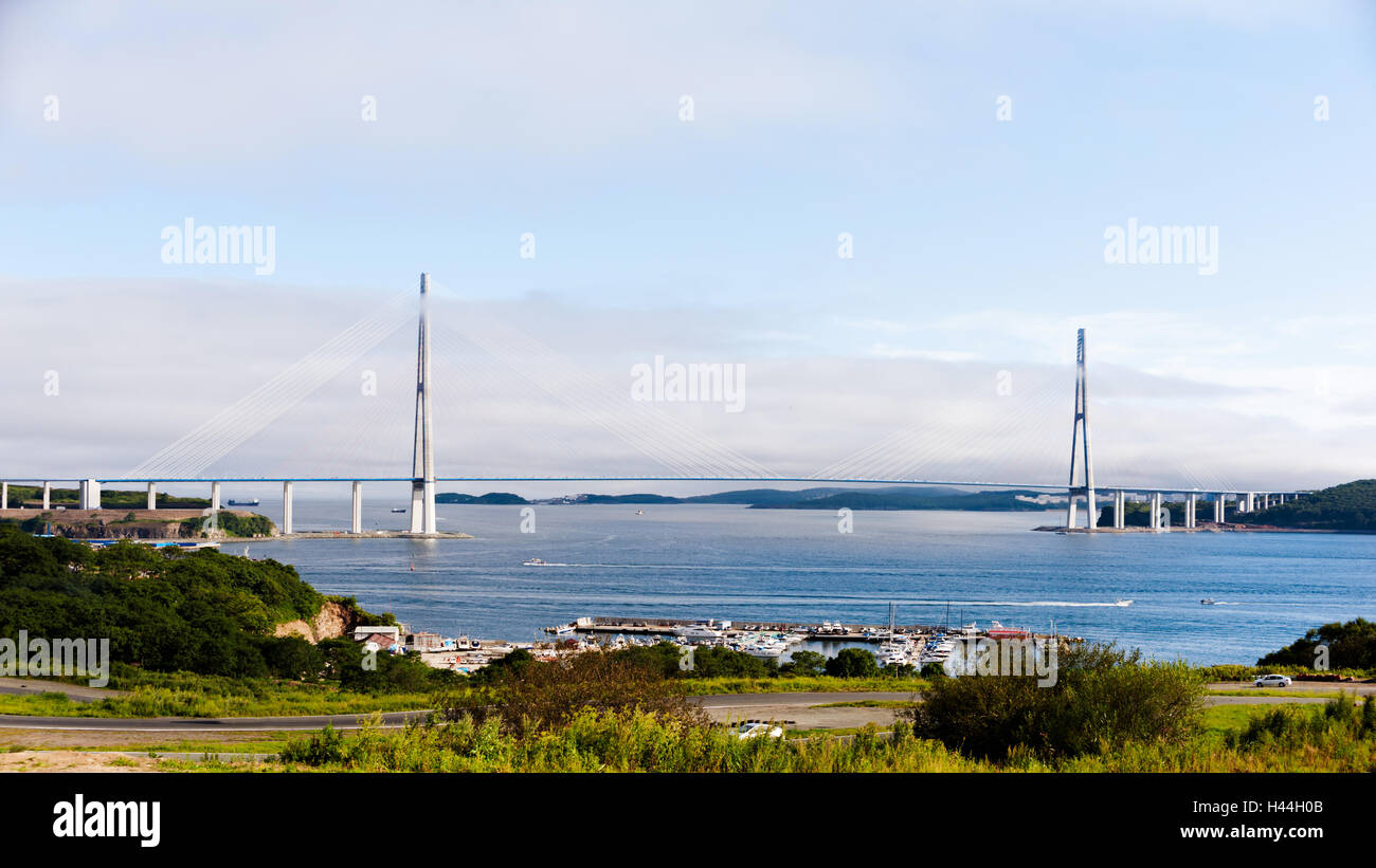 Longest cable-stayed bridge in the world in the Russian Vladivostok over the Eastern Bosphorus strait to the Russky Island. Stock Photo