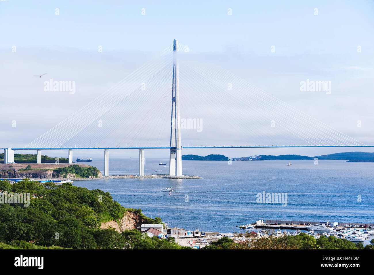 Longest cable-stayed bridge in the world in the Russian Vladivostok over the Eastern Bosphorus strait to the Russky Island. Stock Photo