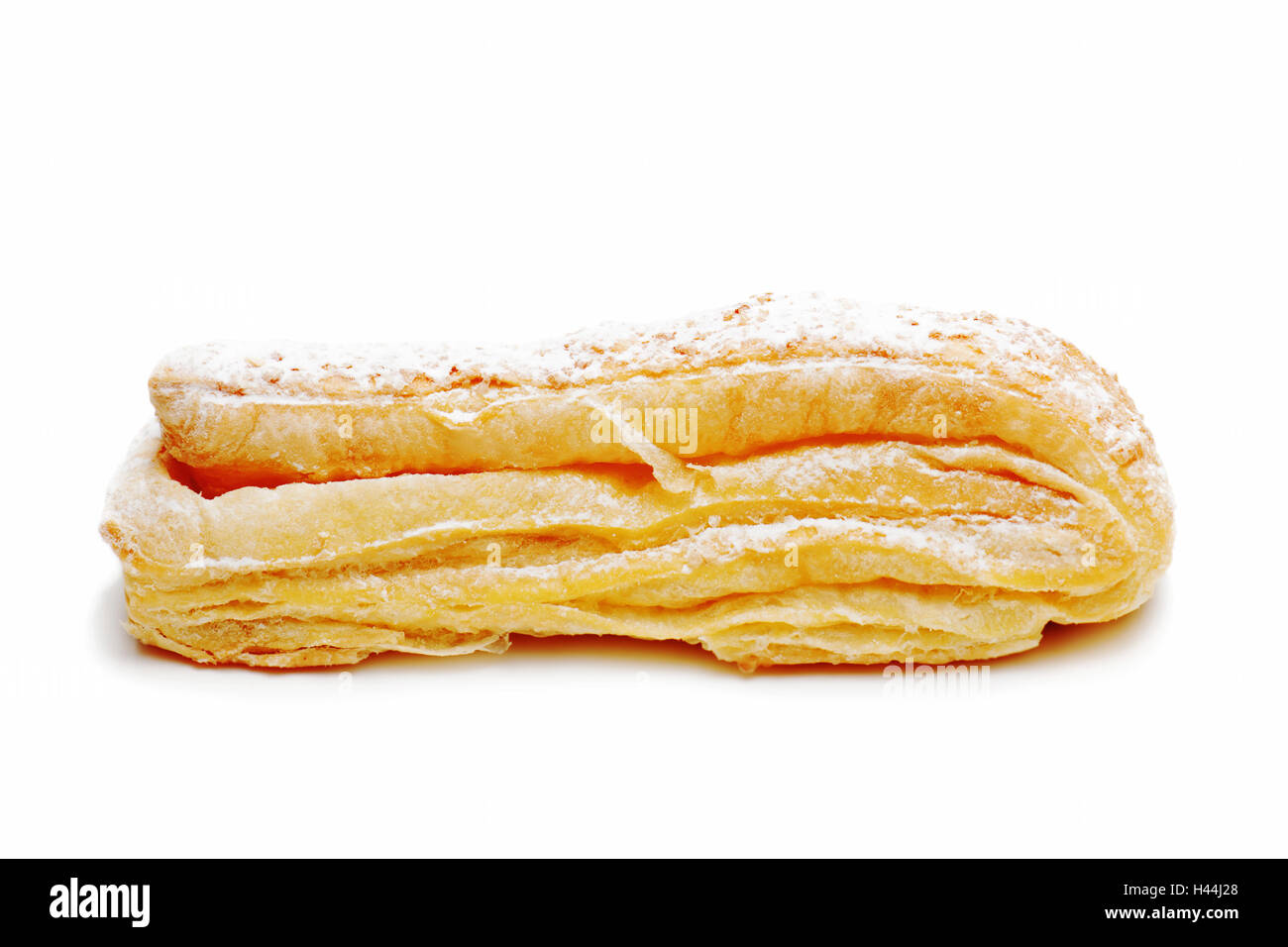Fresh puff pastry roll isolated on the white background. Stock Photo
