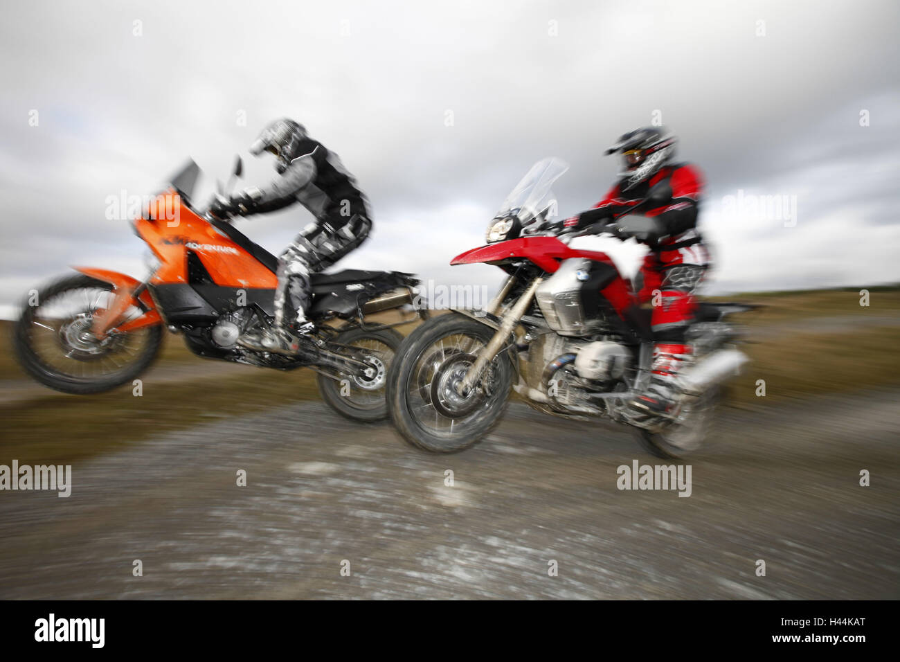 Motorcyclist, KTM and BMW, dynamically, Stock Photo