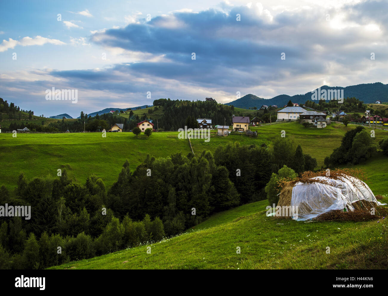 Landscape of a Romanian mountain village Stock Photo - Alamy