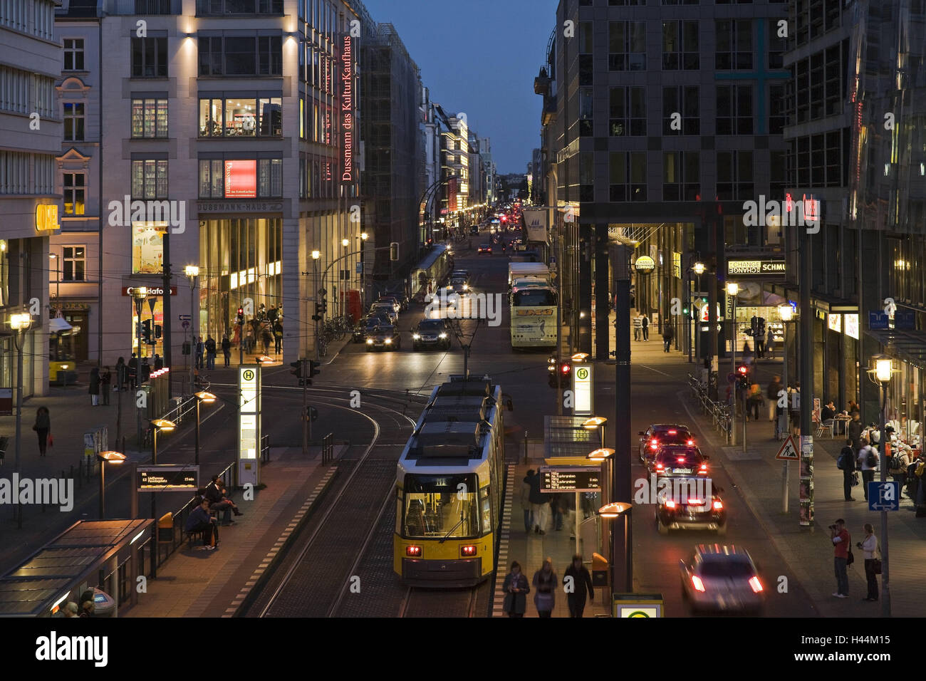 Germany, Berlin, Friedrichstrasse, traffic, lights, evening, town, capital, part town, street, architecture, building, cars, streetcar, means transportation, lights, pedestrians, people, outside, Stock Photo
