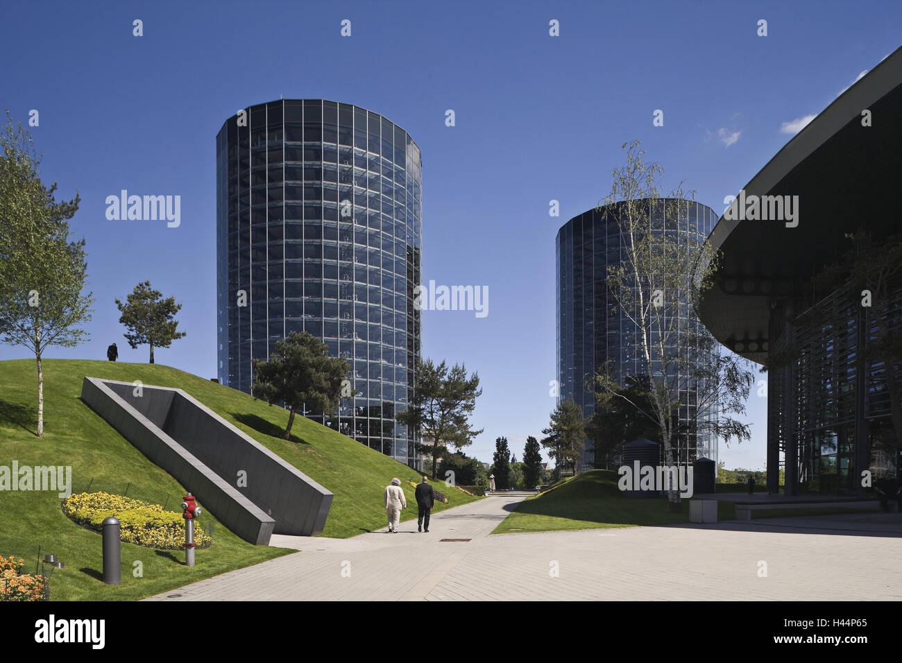 Germany, Lower Saxony, Wolfsburg, autotown, autotowers, town, place of interest, architecture, building, automobile industry, towers, high rises, architecture, park, park, person, tourist, no model release, Stock Photo