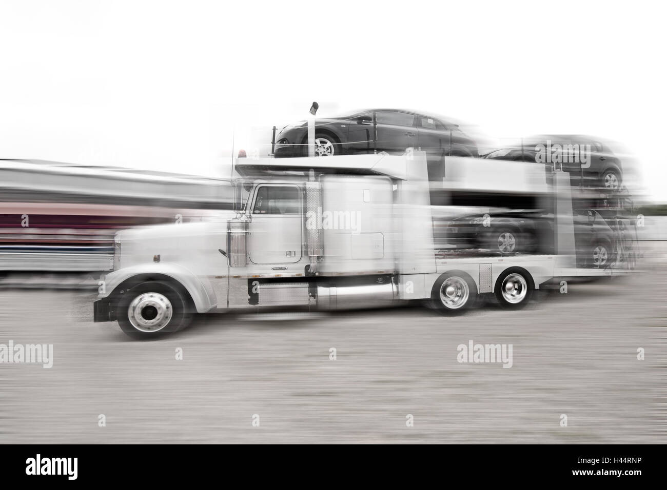American car transporter, blur, Stock Photo