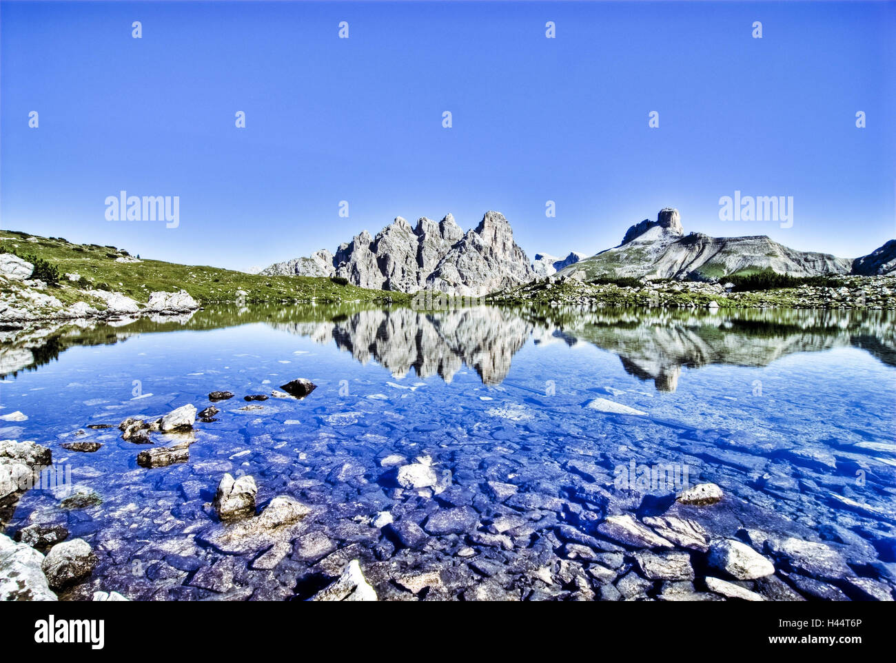 Rienz Italy, South Tyrol, Dolomites, lake at the foot Three pinnacles where ...