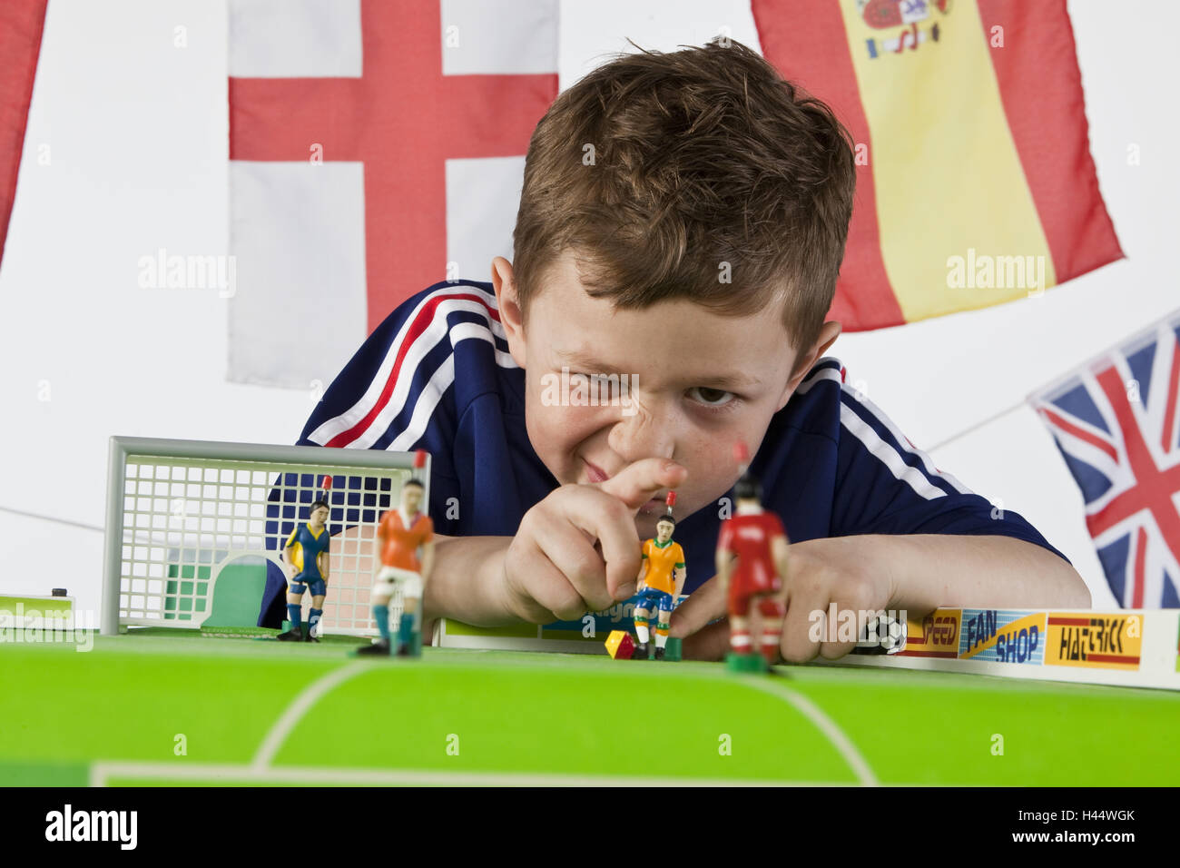 Children, table football, play Stock Photo Alamy