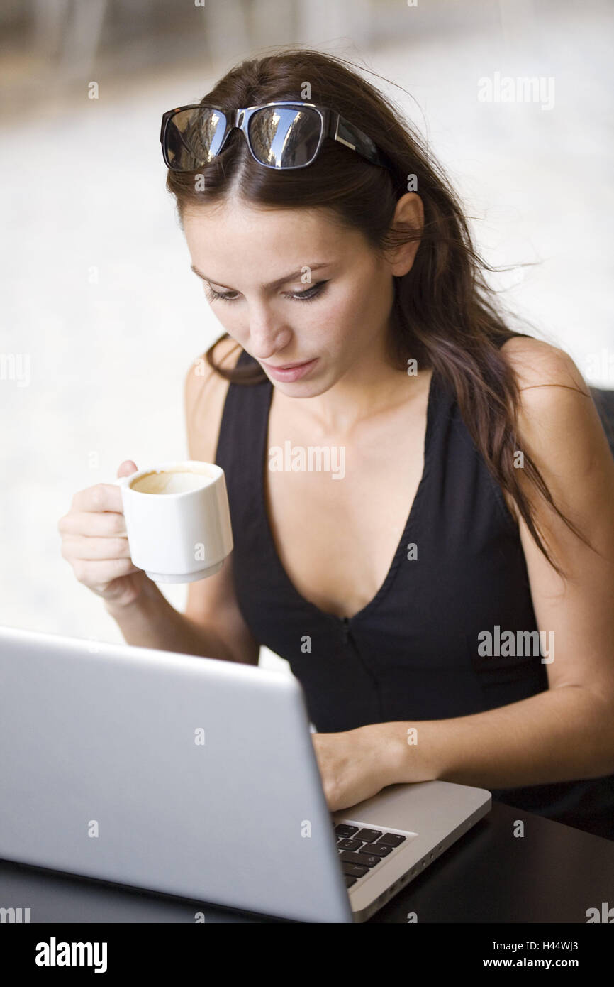 Woman, young, sit, laptop, work, coffee, drink, model released, businesswoman, person, female, brunette, beauty, concentration, thoughtful, sympathetically, top, black, sunglasses, notch, coffee cup, outside, portrait, curled, Stock Photo