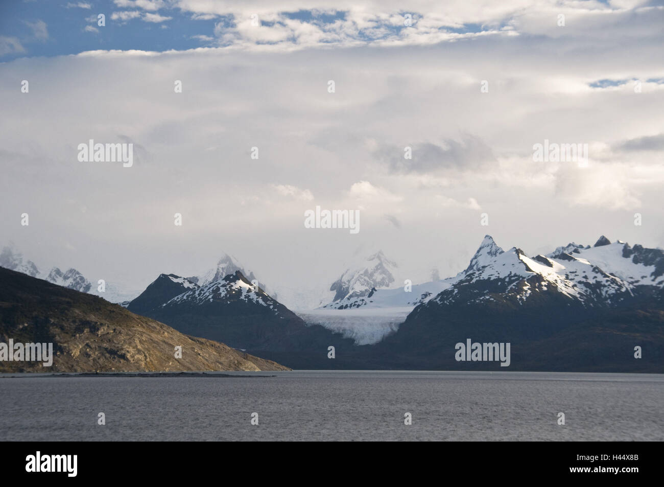 Chile, fjord scenery, fjord Almirantazgo, Andes catena, Cordillera Darwin, cloudy sky, Stock Photo