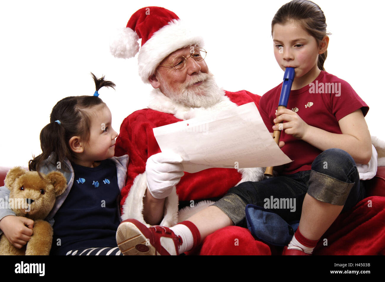 Santa Claus, smile, children, girls, flute play, studio recording, man, person, Santa, Santa Claus, Christmas, lining, cap, glasses, happy, friendly, sisters, two, childhood, recorder, Teddy, Stock Photo